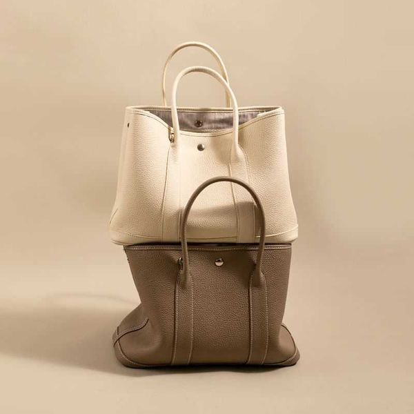 aher max designer leather herme garden bag harris elan garden light luxury large capacity tote female summer white portable commuter
aher max designer leather herme garden bag harris elan garden light luxury large capacity tote female summer white portable commuter
