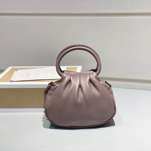 solid color new first layer cowhide leather bag female cloud dumplings handbag mother bag
solid color new first layer cowhide leather bag female cloud dumplings handbag mother bag