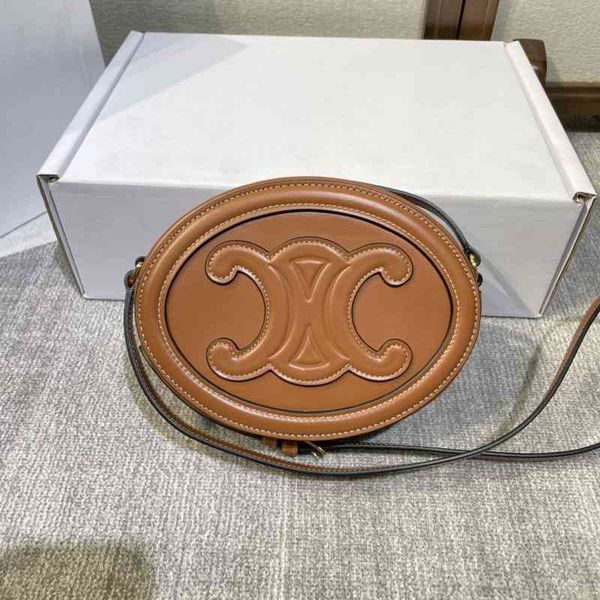 simple fresh and fashionable versatile cowhide triumphal arch moon cake pig nose small round one shoulder cross body lady bag
simple fresh and fashionable versatile cowhide triumphal arch moon cake pig nose small round one shoulder cross body lady bag