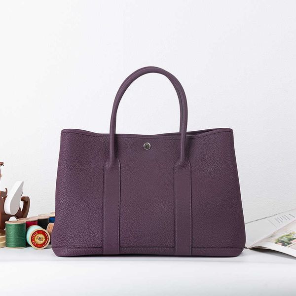 h bag designer fashion head layer leather h erme garden bag high set garden party 30cm full commuter pure hand sewing
h bag designer fashion head layer leather h erme garden bag high set garden party 30cm full commuter pure hand sewing