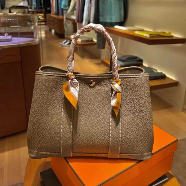 aher max fashion designer herme bag high end leather women garden garden togo cowhide hand large capacity commuter
aher max fashion designer herme bag high end leather women garden garden togo cowhide hand large capacity commuter