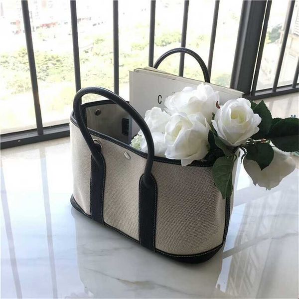 design purse and winter fashion cowhide women's bag garden bag canvas with leather portable one shoulder slant span buns mother middle
design purse and winter fashion cowhide women's bag garden bag canvas with leather portable one shoulder slant span buns mother middle