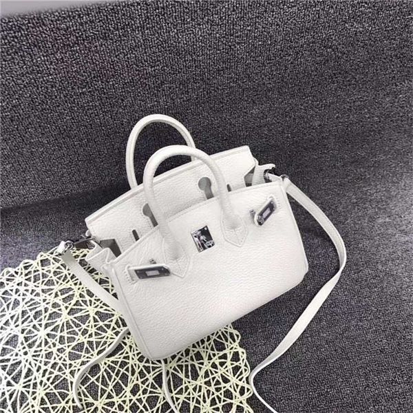 design purse new bag mini one shoulder slant cross handbag layer cowhide star fashion silver buckle
design purse new bag mini one shoulder slant cross handbag layer cowhide star fashion silver buckle