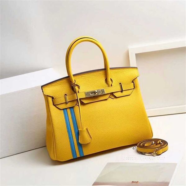 design purse new head layer leather handbag one shoulder slanting bag vertical grain edge fashion
design purse new head layer leather handbag one shoulder slanting bag vertical grain edge fashion