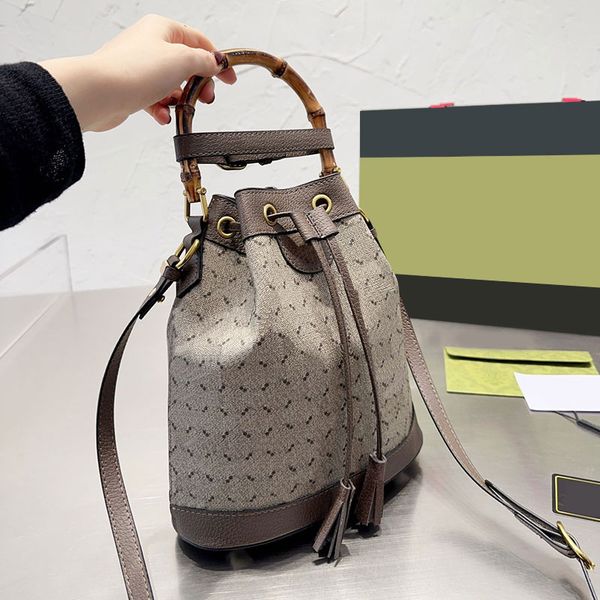leather bucket bag crossbody handbags drawstring shoulder bags fashion tote handbags bamboo handle classic letter prints quality wallet long
leather bucket bag crossbody handbags drawstring shoulder bags fashion tote handbags bamboo handle classic letter prints quality wallet long