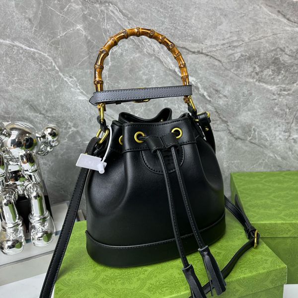 drawstring bucket bag bamboo knuckle handle cross body bags handbags women shoulder messenger bags handbag purse lady pouch fashion letters
drawstring bucket bag bamboo knuckle handle cross body bags handbags women shoulder messenger bags handbag purse lady pouch fashion letters
