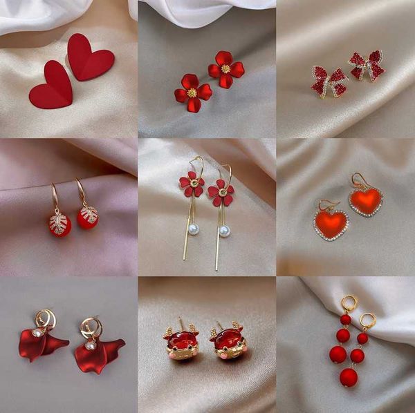 s925 silver needle south korea autumn and winter new red happy pearl earrings temperament versatile female, Golden
s925 silver needle south korea autumn and winter new red happy pearl earrings temperament versatile female, Golden