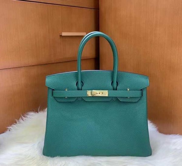 fully handmade 30cm brand bag imported italian togo leather brand bag luxury handbag wasx line stitching many colors to choose fast
fully handmade 30cm brand bag imported italian togo leather brand bag luxury handbag wasx line stitching many colors to choose fast