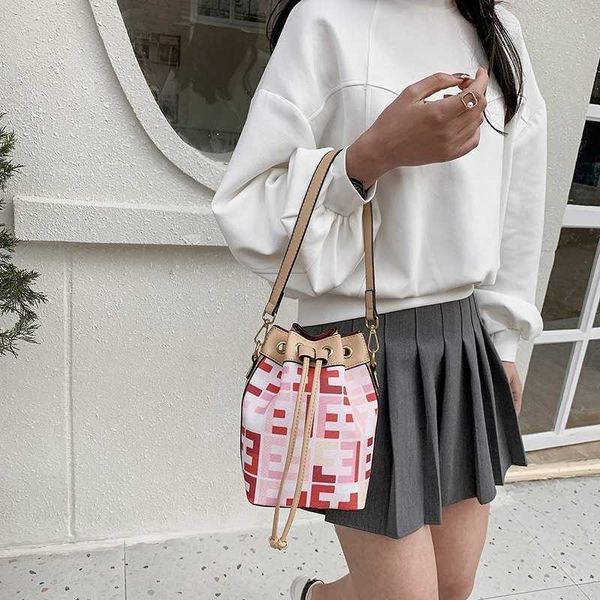designer new printed canvas rainbow bucket bag female flower drawstring sling single diagonal cross wide shoulder strap handbag handbags out
designer new printed canvas rainbow bucket bag female flower drawstring sling single diagonal cross wide shoulder strap handbag handbags out