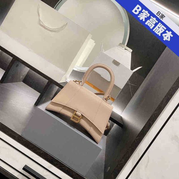 italy handbag balenciga designer buckle b gold high version hourglass milk tea color hand carrying messenger bag postman net red same style
italy handbag balenciga designer buckle b gold high version hourglass milk tea color hand carrying messenger bag postman net red same style