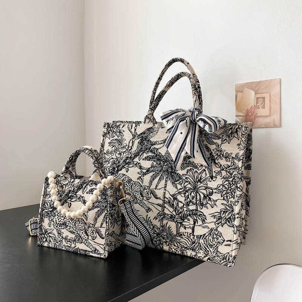 handbag tote bag women's pearl embroidered cotton linen handbag large capacity commuter canvas shoulder bag
handbag tote bag women's pearl embroidered cotton linen handbag large capacity commuter canvas shoulder bag