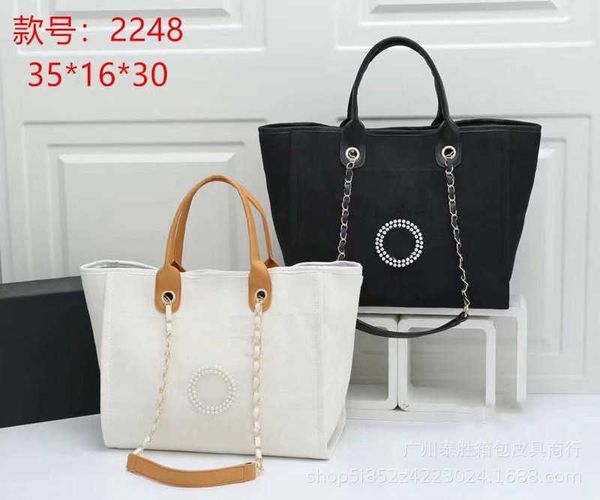 hand small xiangfeng canvas pearl beach bag portable shopping large capacity one shoulder women's bag
hand small xiangfeng canvas pearl beach bag portable shopping large capacity one shoulder women's bag