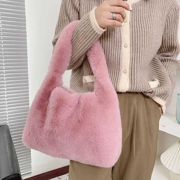 hand wool autumn and winter fashion simple plush bucket women's portable shoulder bag
hand wool autumn and winter fashion simple plush bucket women's portable shoulder bag