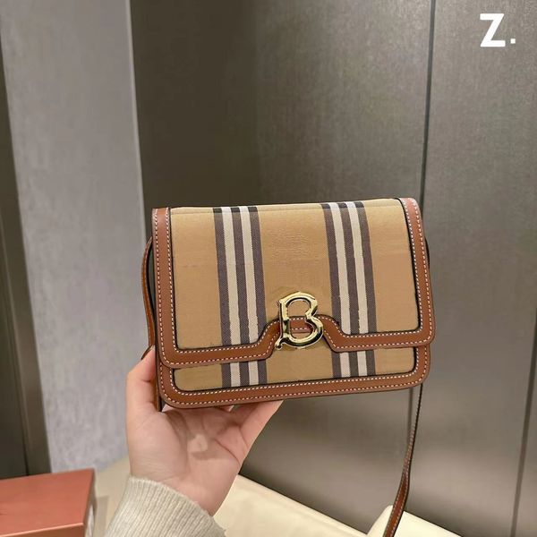 designer shoulder bag women wallet stripes handbag designers leather small bag popular simple fashion very good gift
designer shoulder bag women wallet stripes handbag designers leather small bag popular simple fashion very good gift