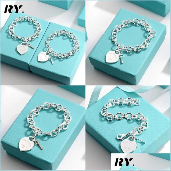 charm bracelets charm bracelets heart design key chain fine jewelry for women golden sier bracelet pseiras famous drop delivery 2022 dh6ar, Golden;silver
charm bracelets charm bracelets heart design key chain fine jewelry for women golden sier bracelet pseiras famous drop delivery 2022 dh6ar, Golden;silver