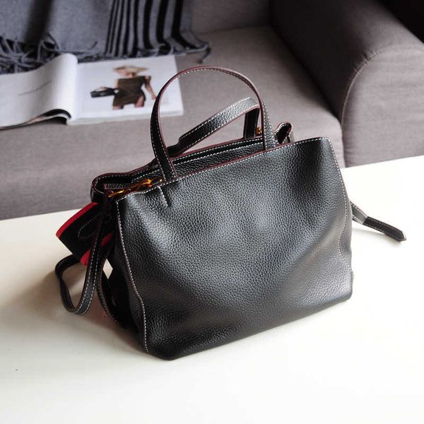 hand soft head double shoulder belt leisure simple leather women's bag portable single shoulder messenger fashion
hand soft head double shoulder belt leisure simple leather women's bag portable single shoulder messenger fashion
