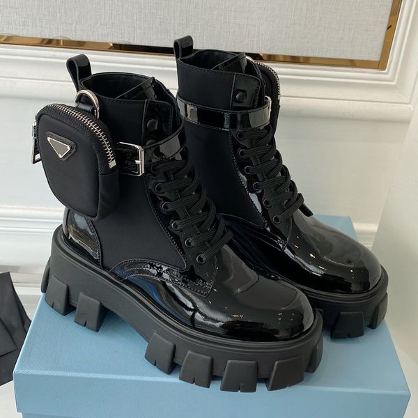 women designer rois martin boots with a detachable nylon bag attached to the ankle black patent leather
women designer rois martin boots with a detachable nylon bag attached to the ankle black patent leather