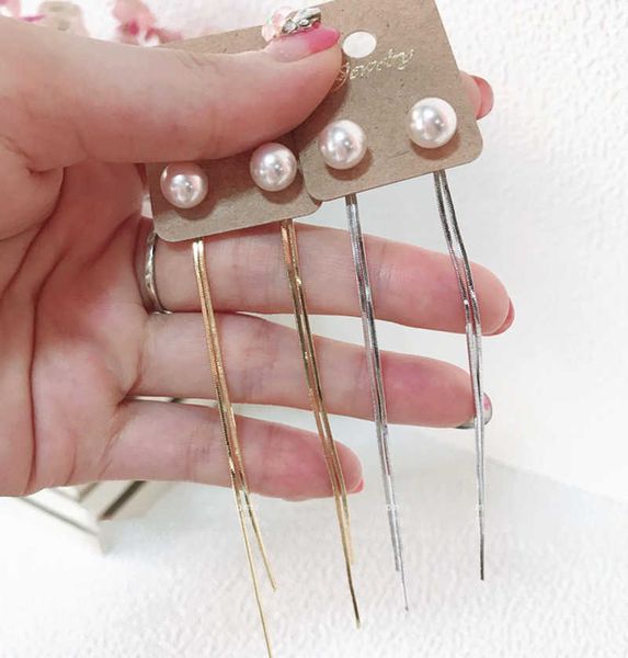 korean charm simple long pearl tassel earrings new fashion show face thin two women wearing silver needle, Golden
korean charm simple long pearl tassel earrings new fashion show face thin two women wearing silver needle, Golden