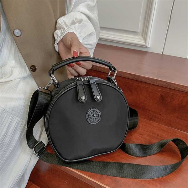 new fashion hand messenger mobile phone coin purse wallet oxford cloth women's shopping travel small round bag purses sale
new fashion hand messenger mobile phone coin purse wallet oxford cloth women's shopping travel small round bag purses sale