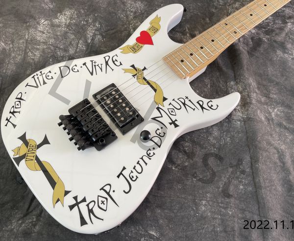 electric guitar with decal on body white color maple neck and fingerboard dots inlay black rock tremolo
electric guitar with decal on body white color maple neck and fingerboard dots inlay black rock tremolo