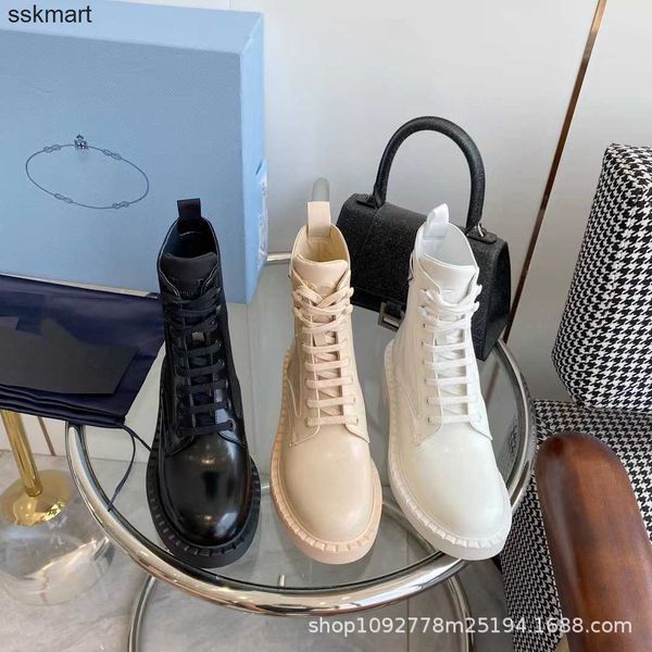 designer 22 rois boots autumn and winter new triangle logo triangle black short boots round head lace thick bottom martin boots
designer 22 rois boots autumn and winter new triangle logo triangle black short boots round head lace thick bottom martin boots