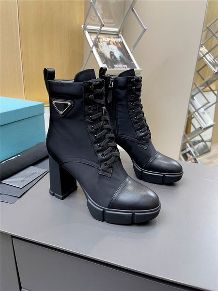 designer luxury womens milano brushed black leather and nylon laced booties boots with original box
designer luxury womens milano brushed black leather and nylon laced booties boots with original box