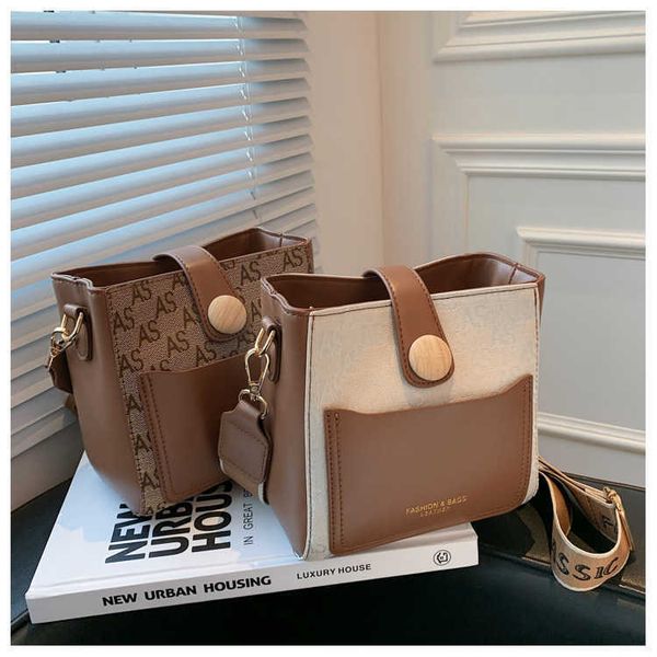 handbag wide strap bucket small women's bag autumn minority portable single shoulder messenger bag crossbody
handbag wide strap bucket small women's bag autumn minority portable single shoulder messenger bag crossbody