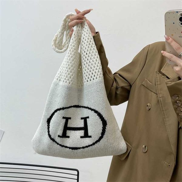handbag hand knitted wool twist woven messenger shoulder bag large capacity portable shopping bag female
handbag hand knitted wool twist woven messenger shoulder bag large capacity portable shopping bag female