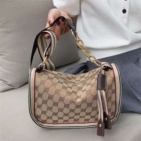 handbag canvas women's bag new fashion wide shoulder strap sling single shoulder messenger bag 
handbag canvas women's bag new fashion wide shoulder strap sling single shoulder messenger bag