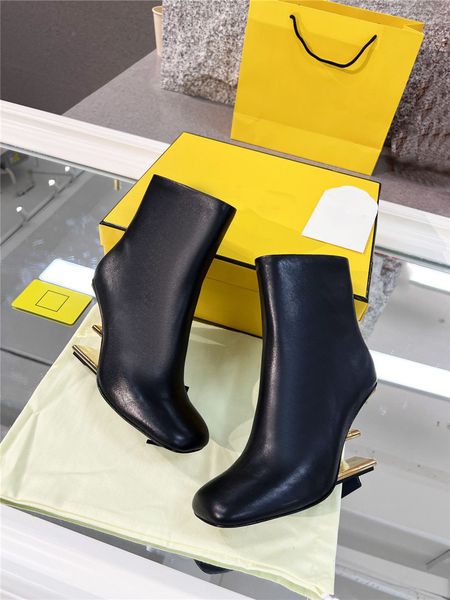 designer luxury first black leather boots with medium heel gold coloured metal boots bootie with original box
designer luxury first black leather boots with medium heel gold coloured metal boots bootie with original box
