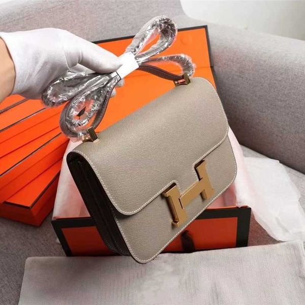 designer handbags consta women messenger bag 2022 new high texture h-button elephant grey bag stewardess tofu small square leather shoulder, Black;red
designer handbags consta women messenger bag 2022 new high texture h-button elephant grey bag stewardess tofu small square leather shoulder, Black;red