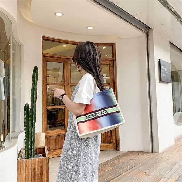 new summer portable canvas bag high capacity fashion graffiti print tote bag shoulder outlet purse
new summer portable canvas bag high capacity fashion graffiti print tote bag shoulder outlet purse