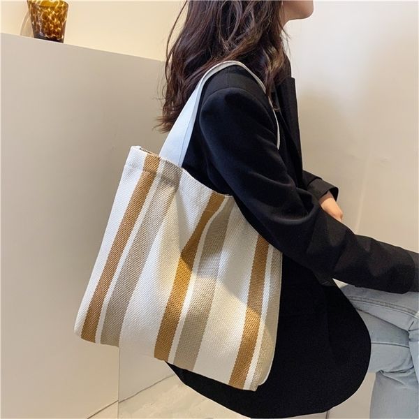 evening bags simple retro handbag small fresh striped canvas for women casual literature and art largecapacity shoulder bag female 221114
evening bags simple retro handbag small fresh striped canvas for women casual literature and art largecapacity shoulder bag female 221114