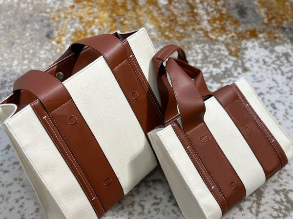 2022 the tote bag cloth color matching leather handbags woody elling designer bag famous shopping fashion shoulder women classic interior ba
2022 the tote bag cloth color matching leather handbags woody elling designer bag famous shopping fashion shoulder women classic interior ba