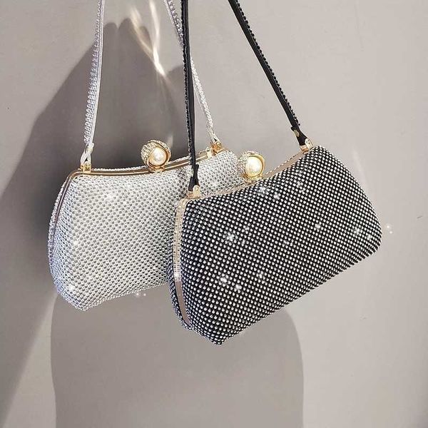 new banquet handbag inlaid with diamond rhinestone dinner bag trendy party shiny hand dress
new banquet handbag inlaid with diamond rhinestone dinner bag trendy party shiny hand dress