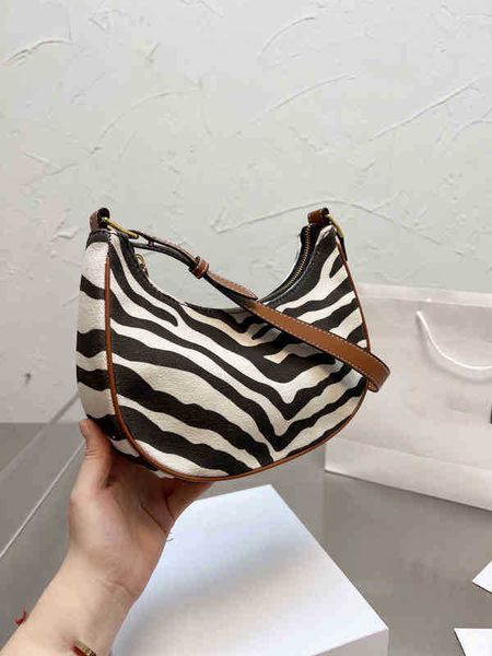 shoulder bags women fashion zebra handbag leather designer crossbody female underarm purses winter trendy
shoulder bags women fashion zebra handbag leather designer crossbody female underarm purses winter trendy