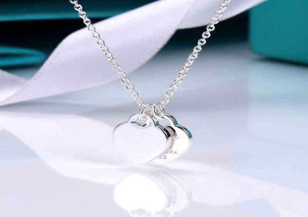 new tiffny s925 sterling silver double heart pendant love necklace love necklace luxury design necklace women birthday gift6883258
new tiffny s925 sterling silver double heart pendant love necklace love necklace luxury design necklace women birthday gift6883258
