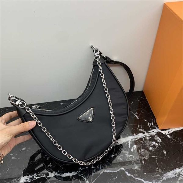 bags nylon cloth chain armpit bag design sense crescent simple and fashionable women's advanced semi-circular purse
bags nylon cloth chain armpit bag design sense crescent simple and fashionable women's advanced semi-circular purse