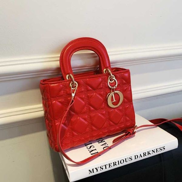 fashion female bag new handbags embroidered thread hand-held one shoulder purse beautiful patent leather princess lingge messenger hand even
fashion female bag new handbags embroidered thread hand-held one shoulder purse beautiful patent leather princess lingge messenger hand even
