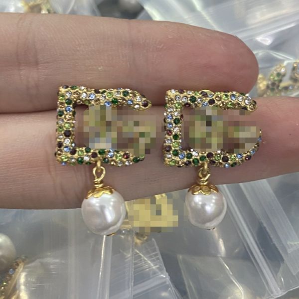 new designed studs brass diamonds earrings d letters pearls pendants 18k gold plated anti allergy women's ear clip designer jewelry gif, Golden;silver
new designed studs brass diamonds earrings d letters pearls pendants 18k gold plated anti allergy women's ear clip designer jewelry gif, Golden;silver