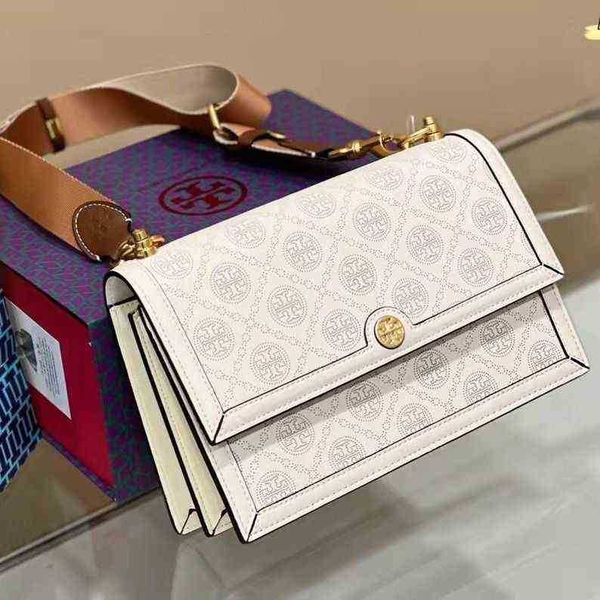 designer torysburchs handbag 2022 miller women's bag hollow out old flower small square bag double single organ jacquard single shoulde
designer torysburchs handbag 2022 miller women's bag hollow out old flower small square bag double single organ jacquard single shoulde