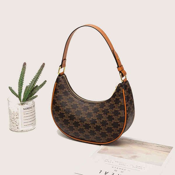 20222022 new triumph underarm bag women's printed stick advanced single shoulder small handbag11
20222022 new triumph underarm bag women's printed stick advanced single shoulder small handbag11