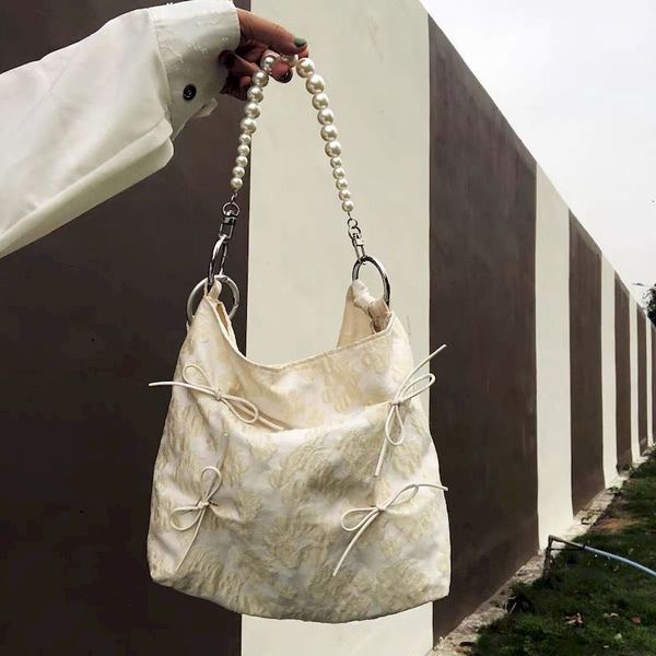 evening bags retro niche jacquard tote spring and summer fashionable bow pearl single shoulder diagonal female waistbag 221118
evening bags retro niche jacquard tote spring and summer fashionable bow pearl single shoulder diagonal female waistbag 221118