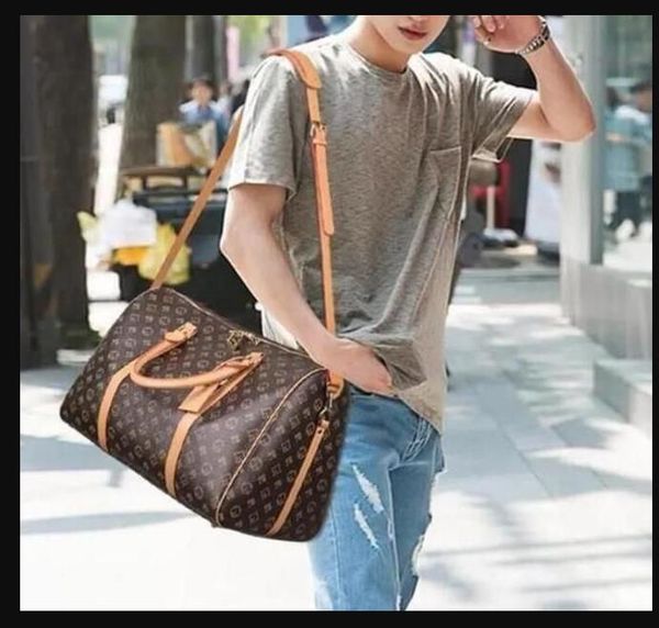 leather large capacity women travel bags 2022 sale quality men shoulder duffel bags carry on luggage bottom rivets with lock head
leather large capacity women travel bags 2022 sale quality men shoulder duffel bags carry on luggage bottom rivets with lock head