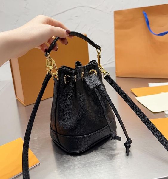 women leather mini drawstring bucket bag letter printing handbags shoulder bags fashion designer handbag classic messenger bag womens leisur
women leather mini drawstring bucket bag letter printing handbags shoulder bags fashion designer handbag classic messenger bag womens leisur