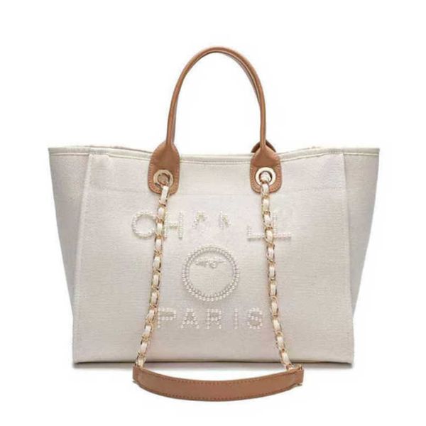 women's fashion luxury evening bags ch brand canvas handbag classic pearl beach hand bag designer female large backpack small packs por 
women's fashion luxury evening bags ch brand canvas handbag classic pearl beach hand bag designer female large backpack small packs por