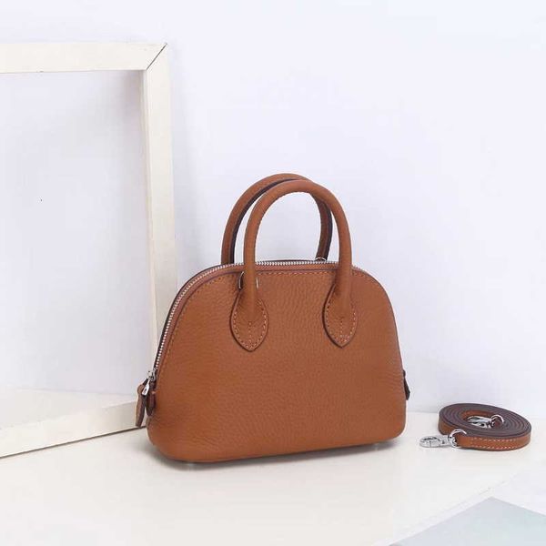 sell designer bags on the 2023 new 18cm shell wrap head layer cowhide litchi pattern mini bowling ball handheld leather women's bag cro
sell designer bags on the 2023 new 18cm shell wrap head layer cowhide litchi pattern mini bowling ball handheld leather women's bag cro