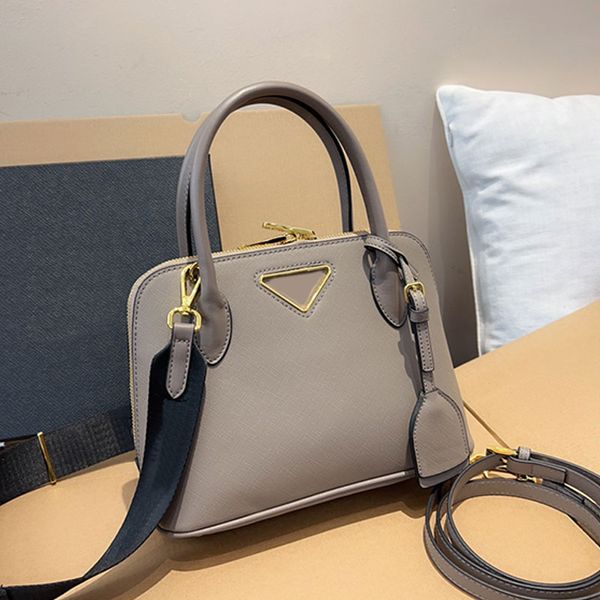 shell crossbody shoulder bag women handbags purse genuine leather zipper closure fashion letters removable long strap classic tote bags 
shell crossbody shoulder bag women handbags purse genuine leather zipper closure fashion letters removable long strap classic tote bags