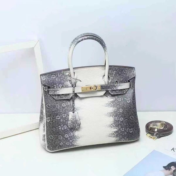 sell designer bags on the h new lizard pattern cow leather large capacity portable fashion simple women's shoulder
sell designer bags on the h new lizard pattern cow leather large capacity portable fashion simple women's shoulder