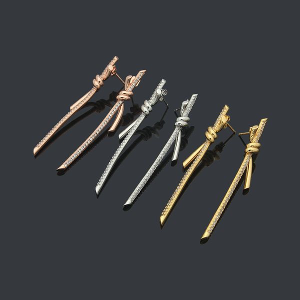 Womens Long knotted drill earrings Studs Designer Jewelry Knot of Studs gold/silvery/rose Full Brand as Wedding Christmas Gift
Womens Long knotted drill earrings Studs Designer Jewelry Knot of Studs gold/silvery/rose Full Brand as Wedding Christmas Gift